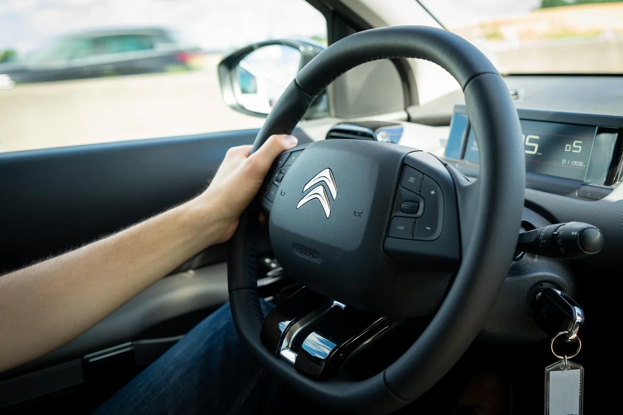 auto, steering wheel, vehicle, automotive, hand, driver, transport. Courier driver employee vs contractor Canada: how CRA decides