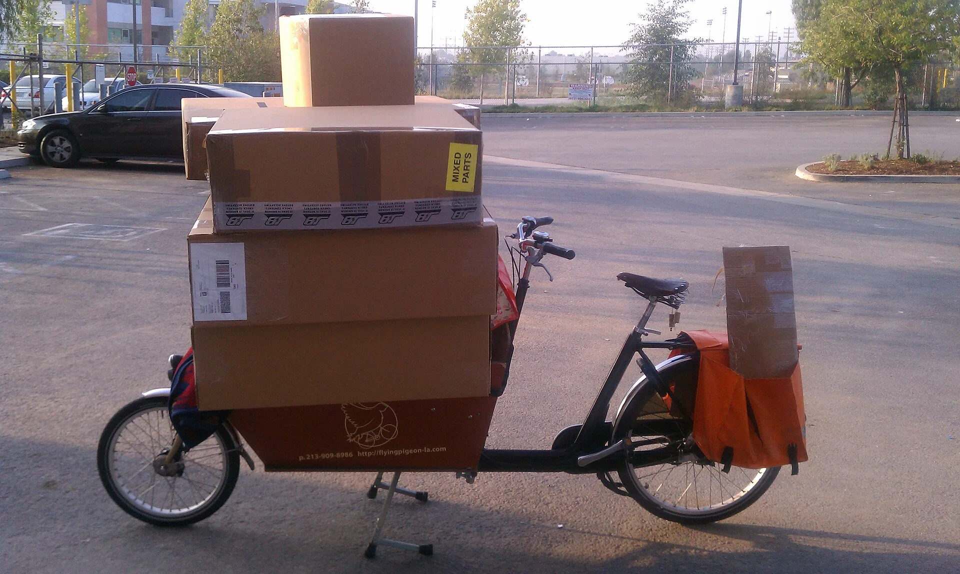 This is about 140 lbs. of cargo, which isn't that bad. The bike boxes laid sideways are what make things a little tricky in turns. Until I switched to UPS, I was doing a run like this maybe once or twice every two weeks. Local delivery equipment reviewed: what holds up and what does not