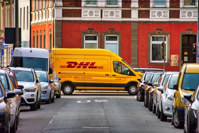 dhl, delivery, cars, street, parked cars, package delivery, parcel service, parcel delivery, van, delivery van, vehicles, transportation, courier, courier service, courier delivery. Same day delivery rates for retailers: what platforms charge